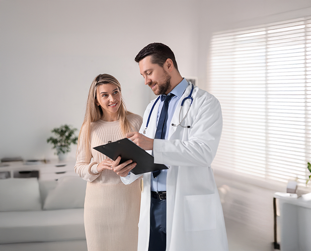 Physician consulting patient